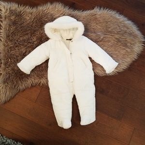 White infant snowsuit